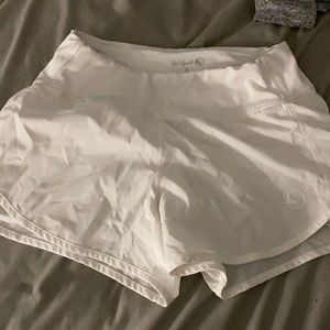 white shorts good condition adult small
